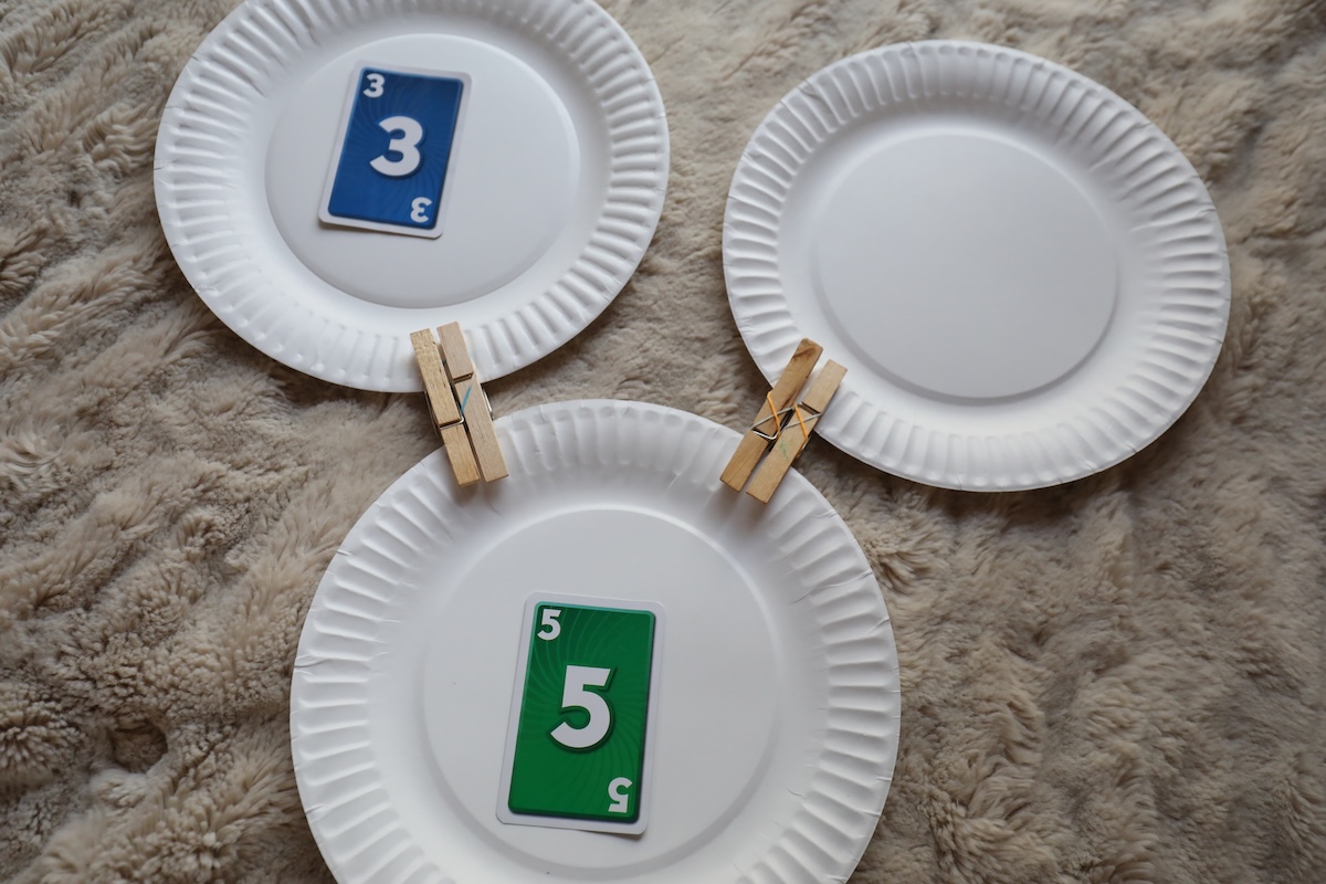 Teaching a Child How to Add Using a Target Number (5) and Hidden Parts When Learning Addition